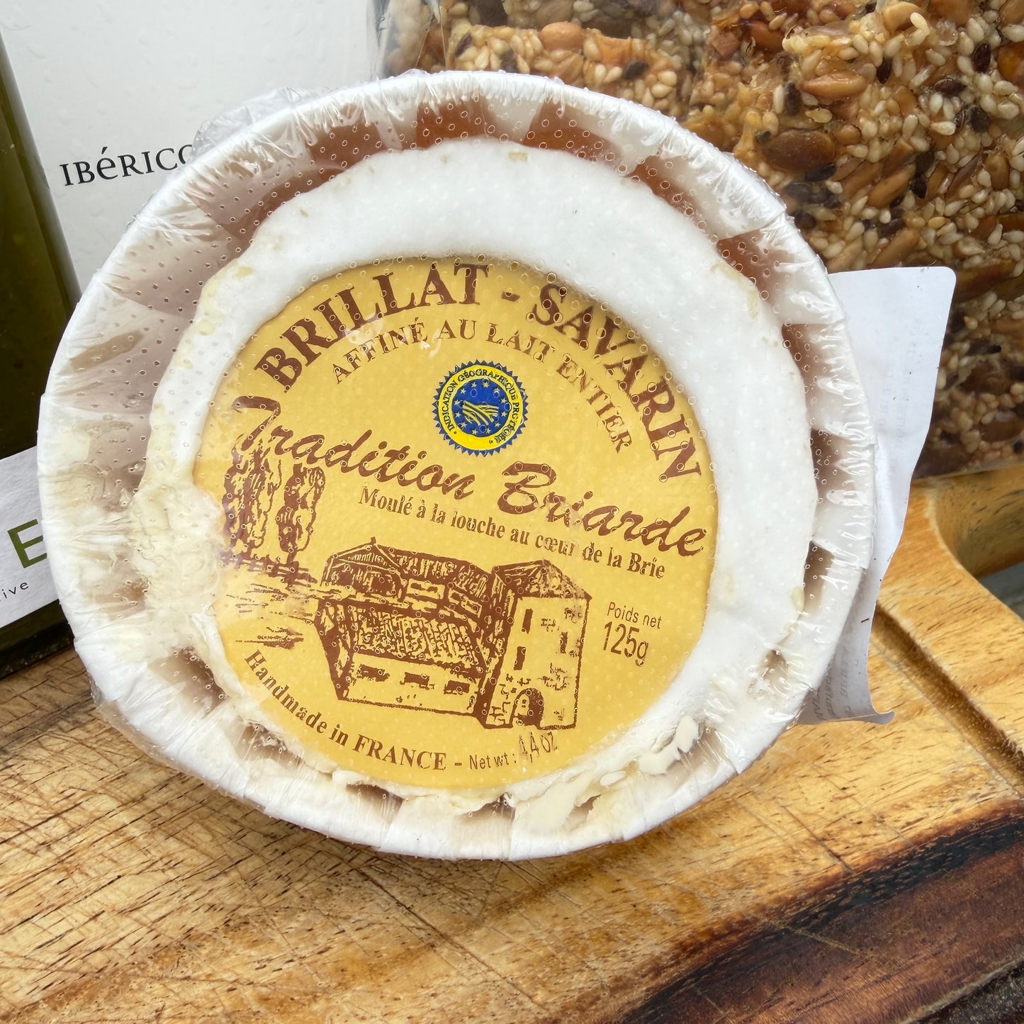 An image of Brillat Savarin triple cream cheese in a wooden case.