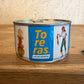 Can of Toreras picante banderillas on a wooden surface