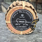 Sheep cheese with 'Finca Pascualete' label on a stone surface