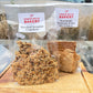 Two packages of Chalk Hills Bakery crackers on a wooden surface